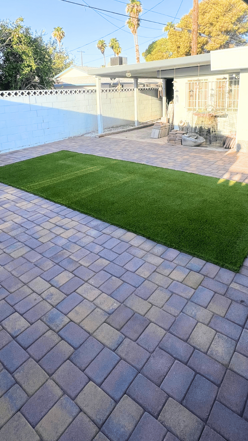 After synthetic grass and pavers installation